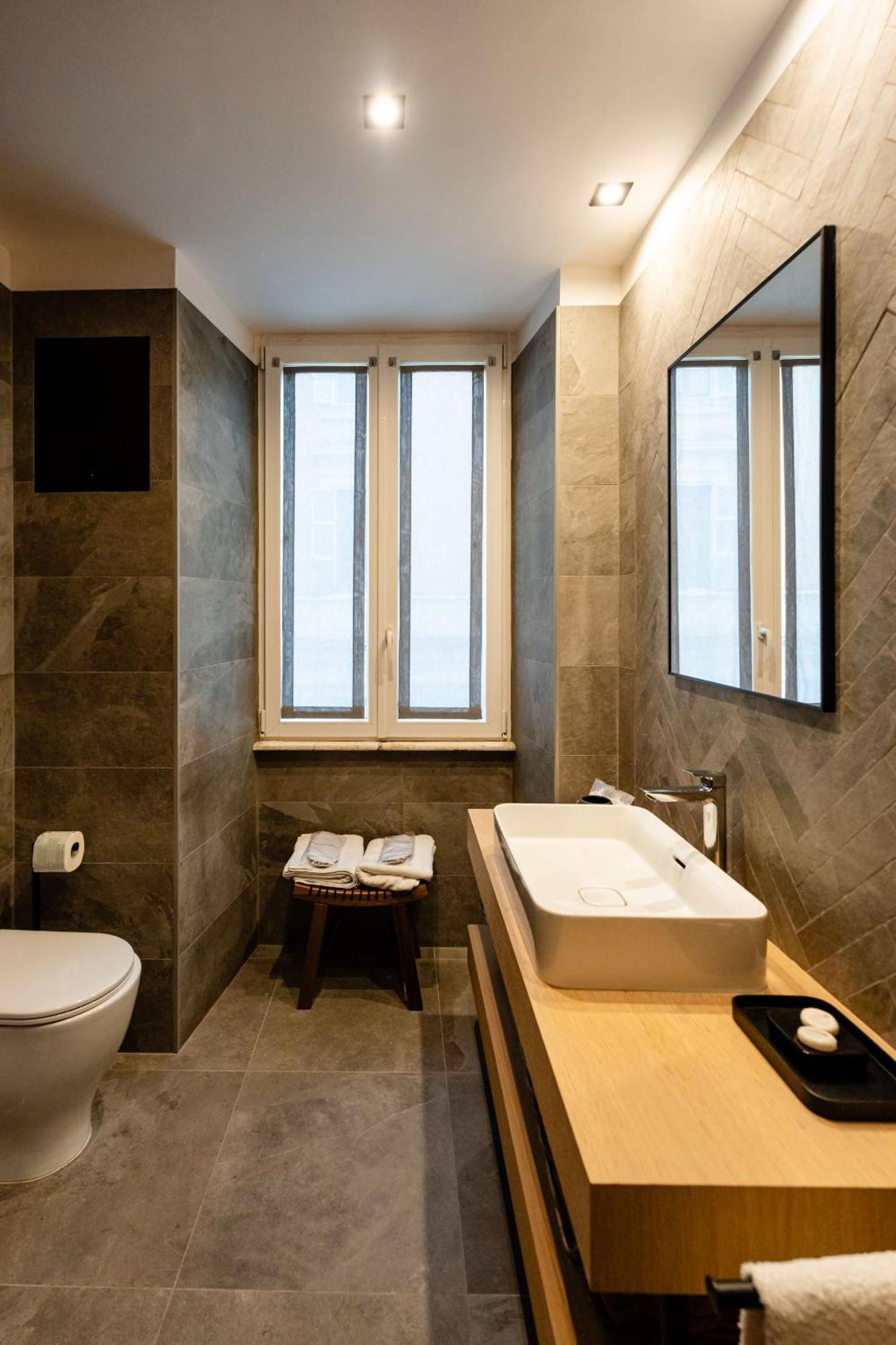 Appartement Tolemaide Orange Rome